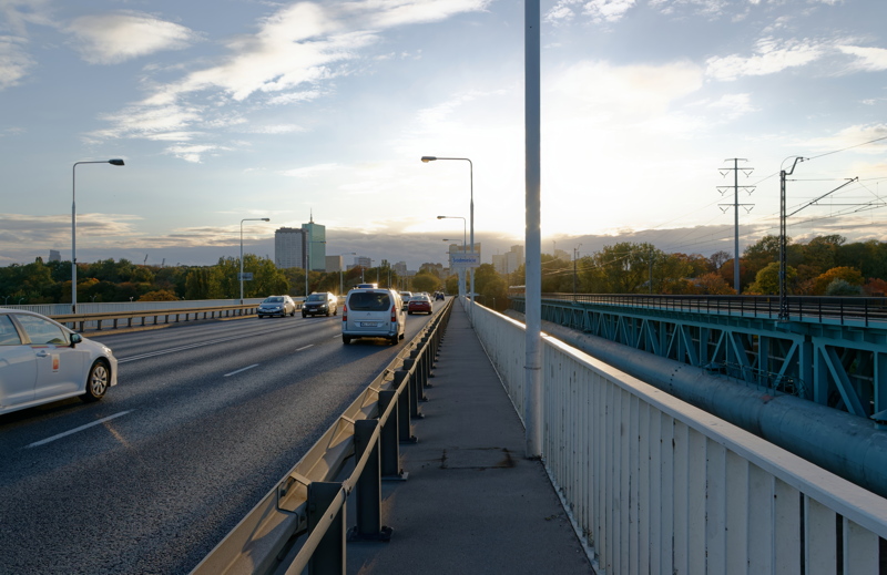14 - A traffic scene on a road bridge in Warsaw, Poland, featuring multiple lanes of cars